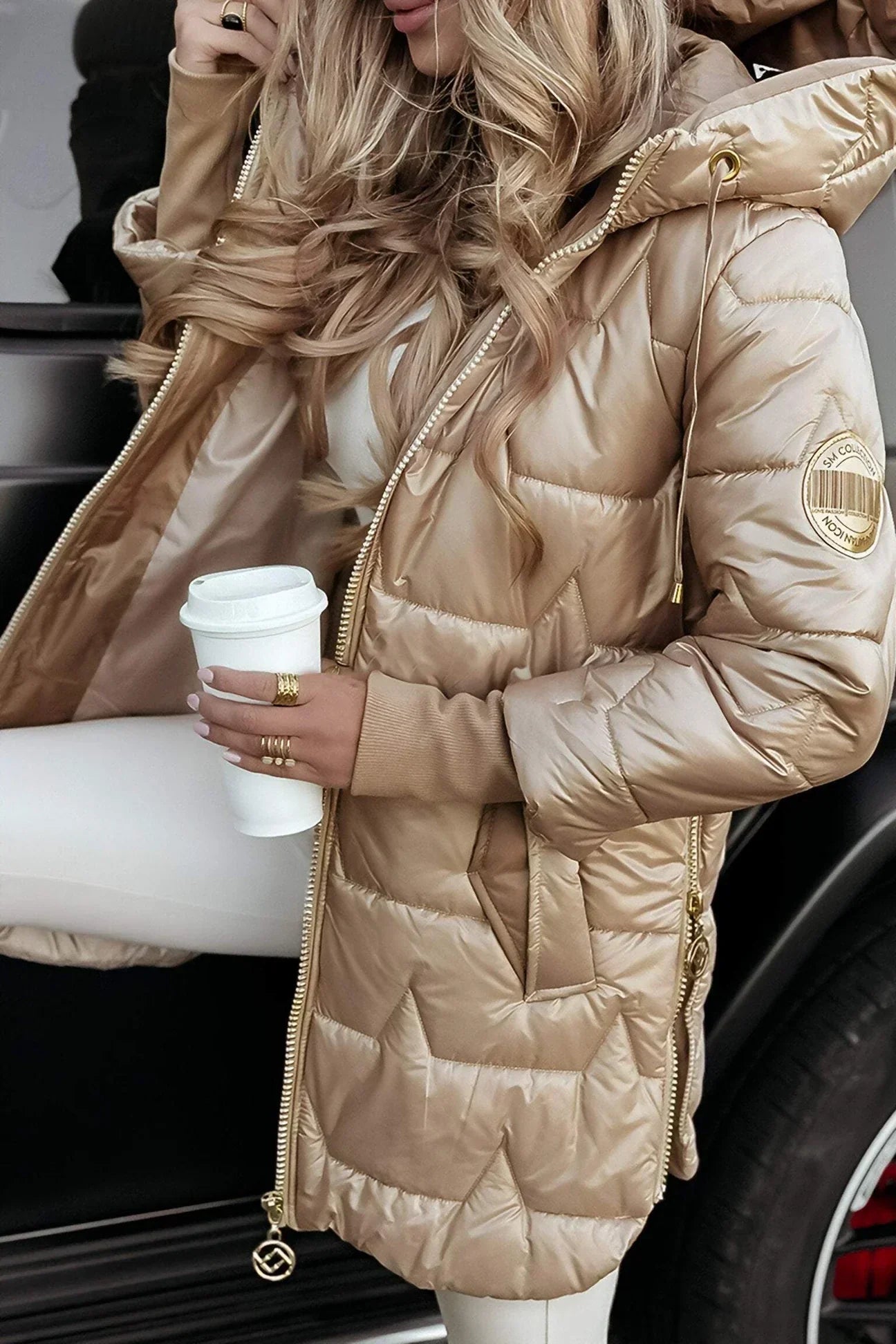 Nora – Manteau d’hiver élégant avec capuche et matelassage